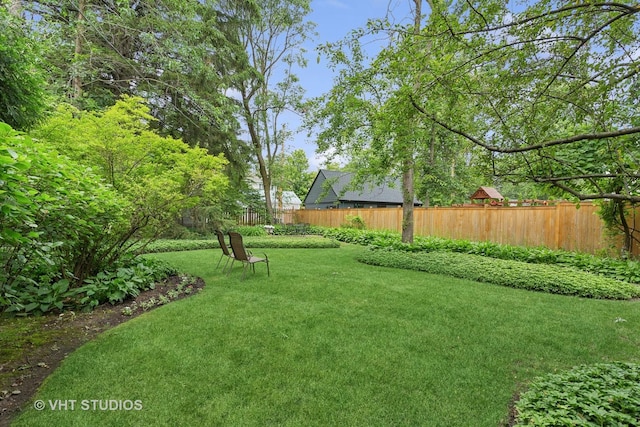 view of yard featuring fence