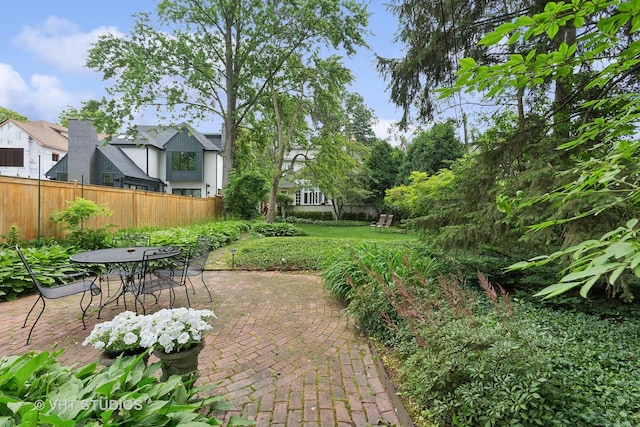 view of yard with a patio area and fence
