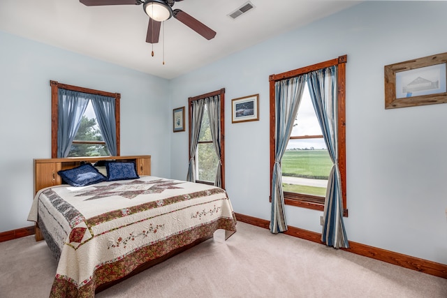 carpeted bedroom with ceiling fan