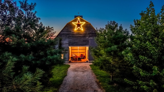 view of outdoor structure at dusk