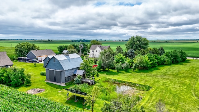 birds eye view of property featuring a rural view