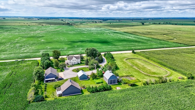 birds eye view of property featuring a rural view