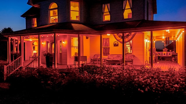 back of property featuring a porch