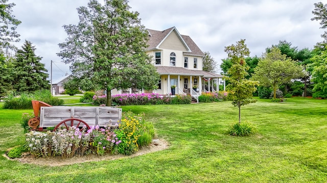 exterior space with a front lawn and a porch