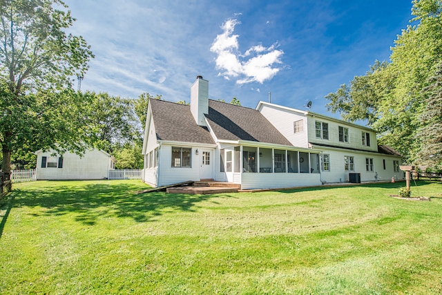 back of house with a yard