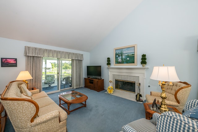 living room featuring high vaulted ceiling, carpet floors, and a tile fireplace