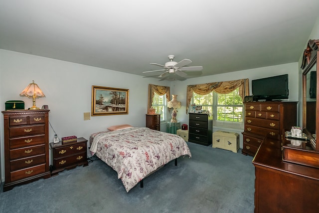 bedroom featuring ceiling fan and carpet flooring