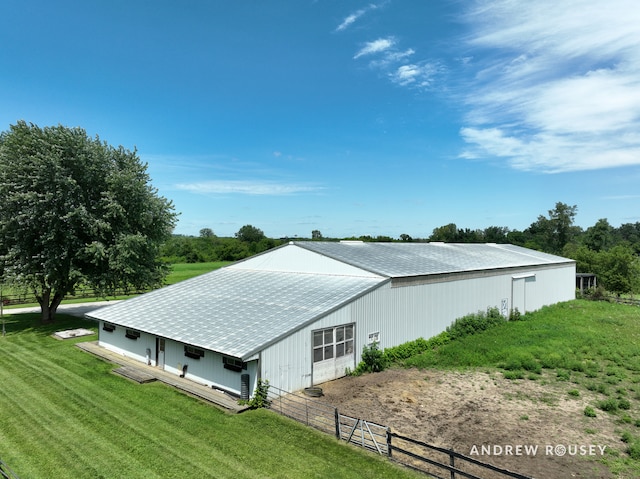 view of property exterior with a yard