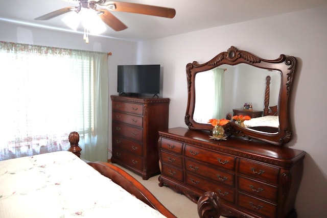 bedroom featuring ceiling fan and carpet flooring