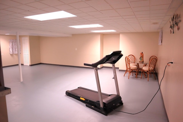 workout area with a drop ceiling