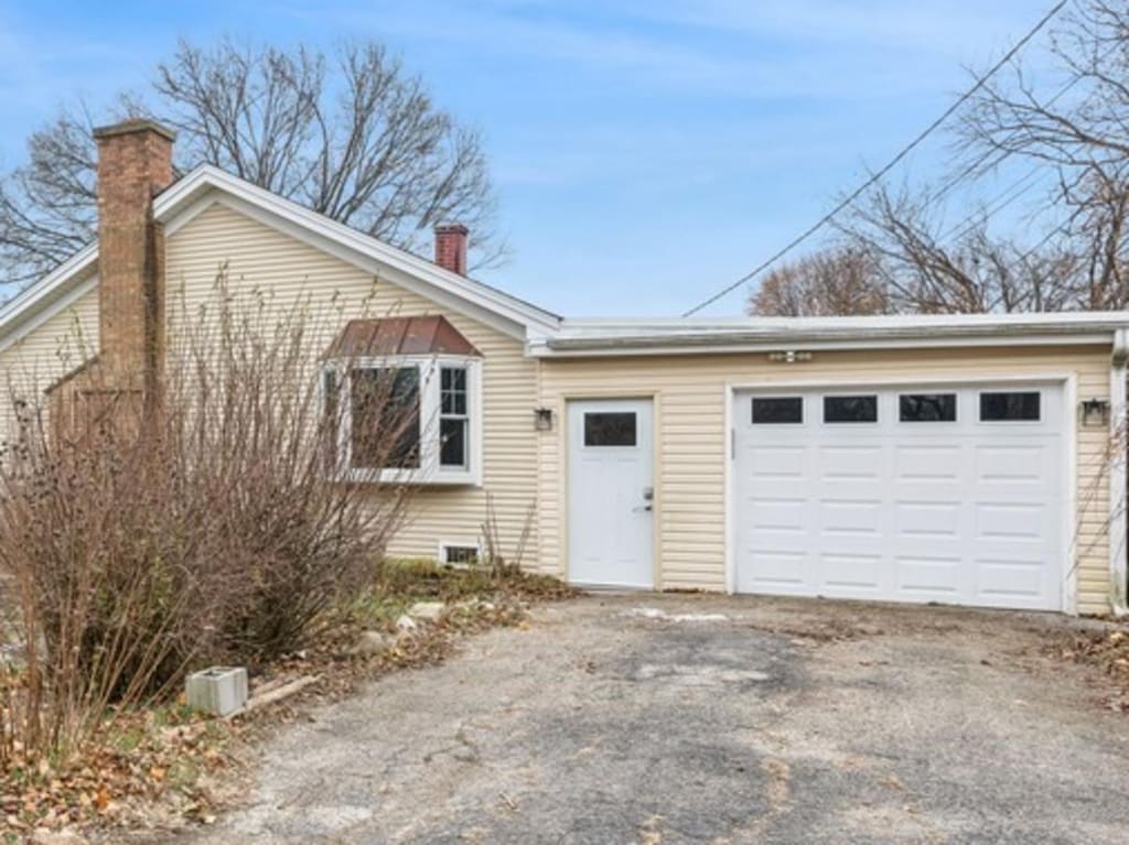 view of home's exterior featuring a garage