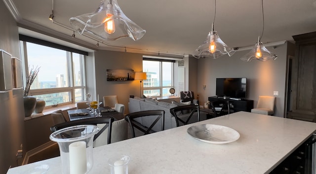 dining space with crown molding