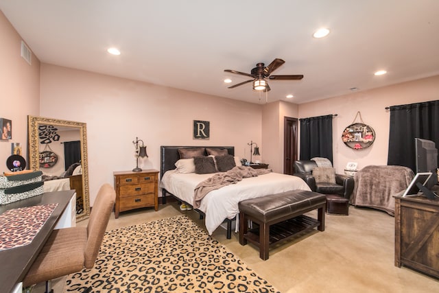 bedroom featuring ceiling fan and light colored carpet