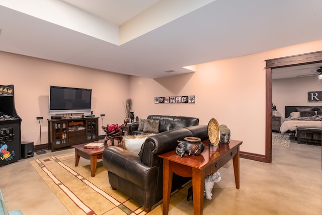 living room with ceiling fan