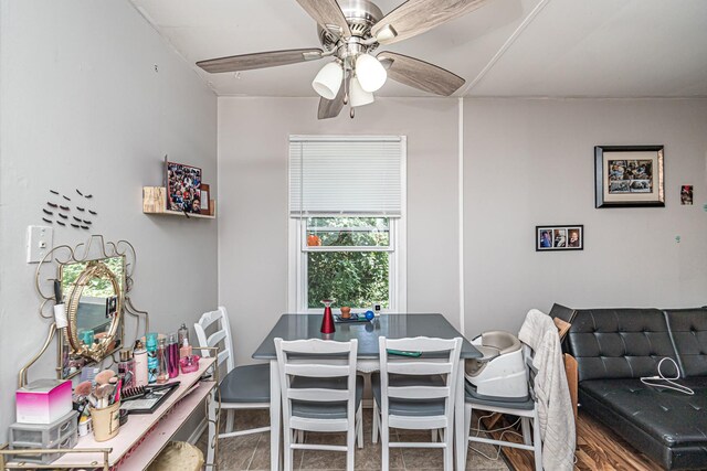 dining space featuring ceiling fan