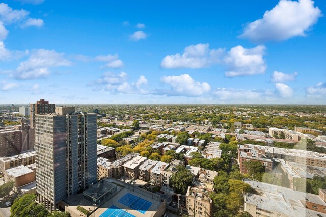 drone / aerial view featuring a city view