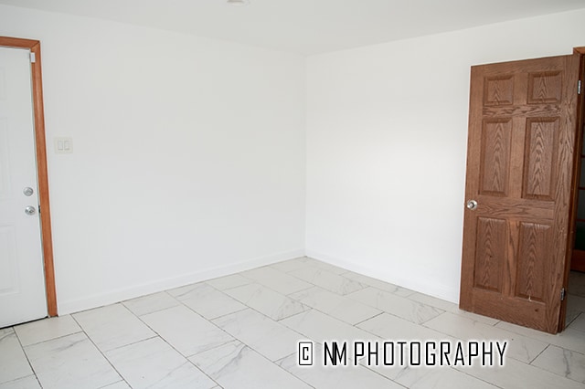 view of tiled spare room