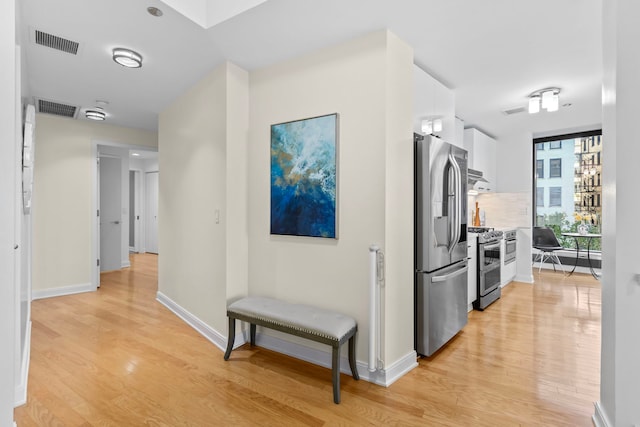 hall featuring light wood-type flooring