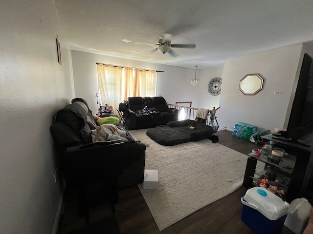 living room with wood-type flooring and ceiling fan