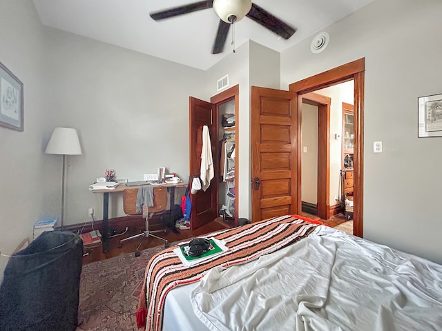 bedroom with ceiling fan and wood-type flooring