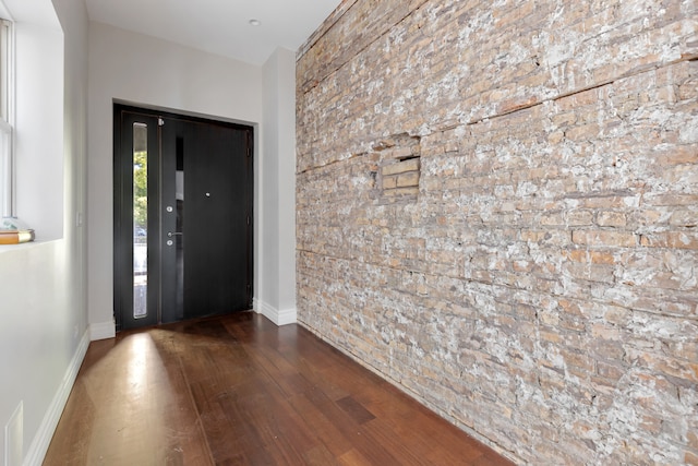 entrance foyer with hardwood / wood-style floors