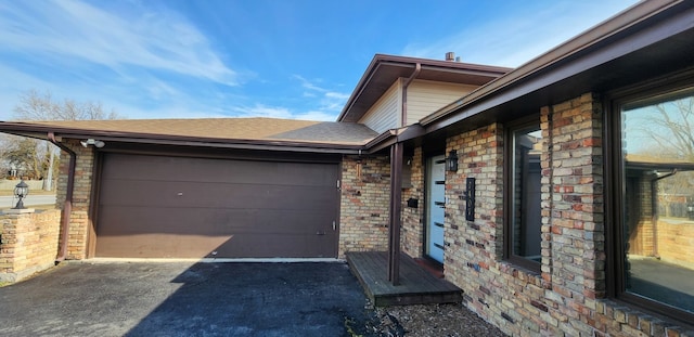 view of side of property featuring a garage