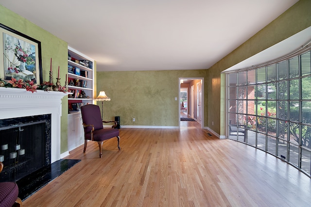 sitting room featuring light wood-type flooring