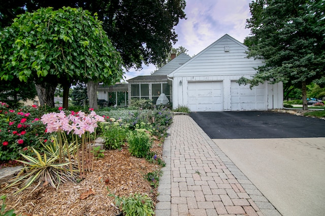 view of front of home with a garage