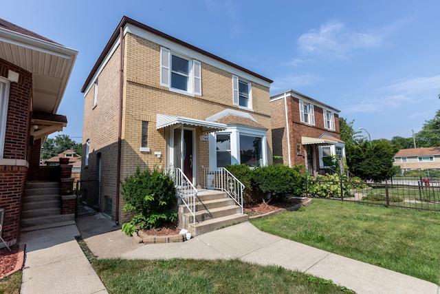 view of front facade featuring a front yard