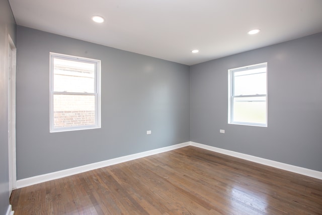 empty room featuring hardwood / wood-style floors