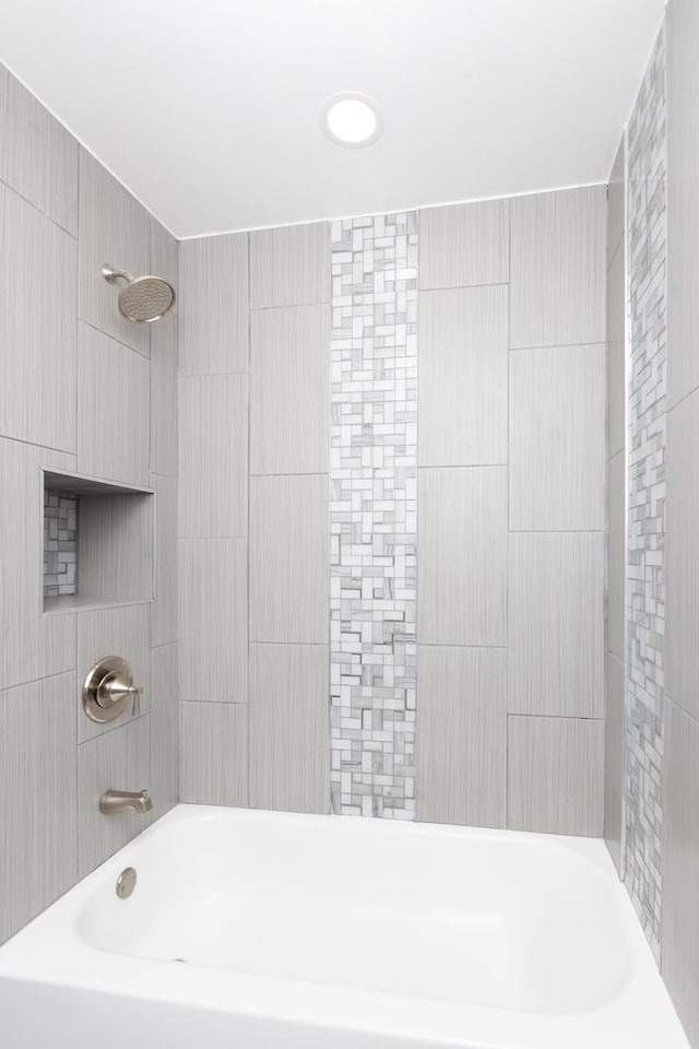 full bathroom with washtub / shower combination
