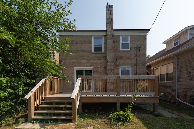 rear view of house with a deck