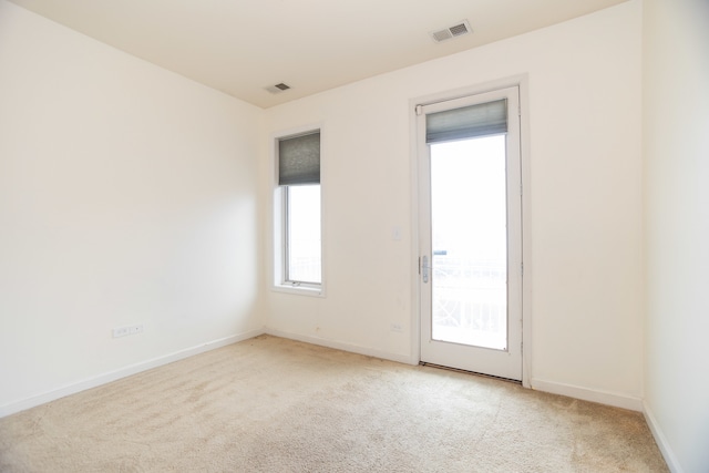 view of carpeted spare room