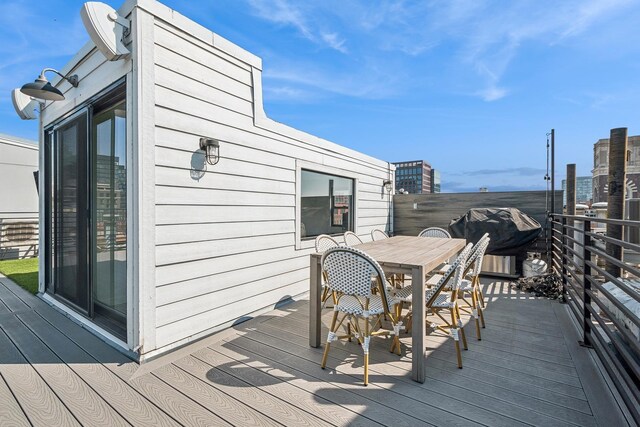 wooden deck with area for grilling