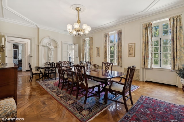 dining room with ornamental molding, parquet floors, and a notable chandelier