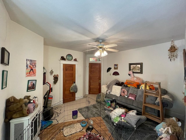 living room featuring ceiling fan