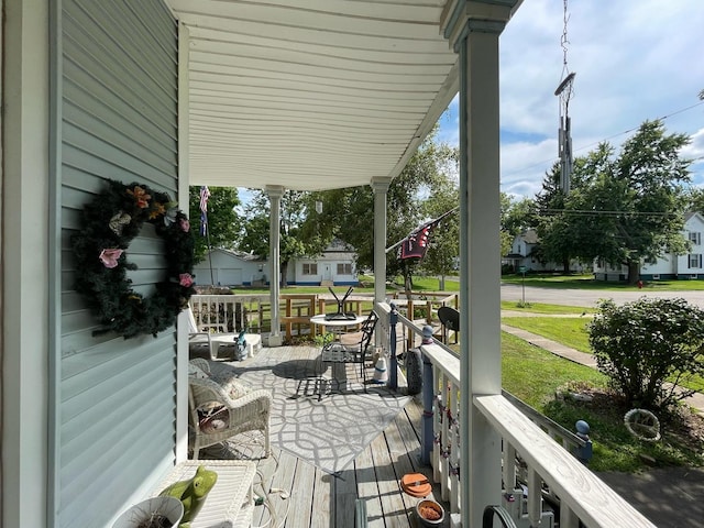 wooden terrace with covered porch