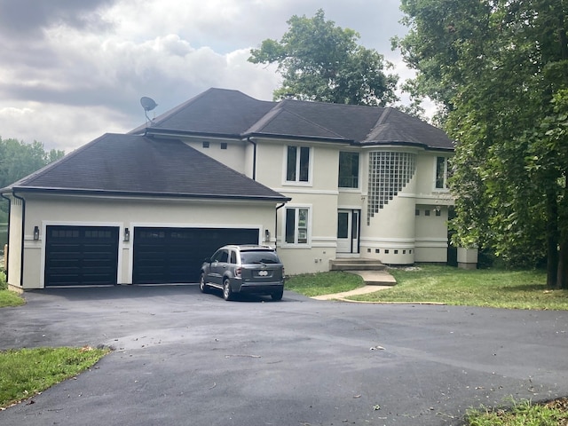 front of property featuring a garage