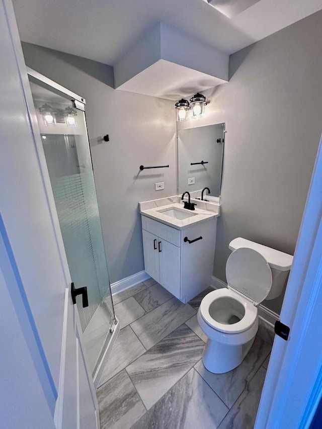 bathroom featuring walk in shower, tile patterned floors, vanity, and toilet