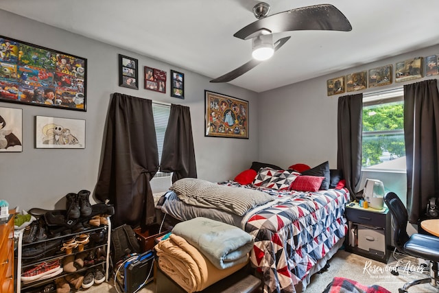 carpeted bedroom featuring ceiling fan