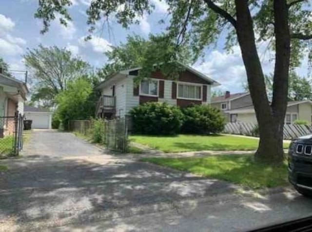 16423 Marshfield Ave, Markham, IL 60428 - view of front of property with a front lawn and fence