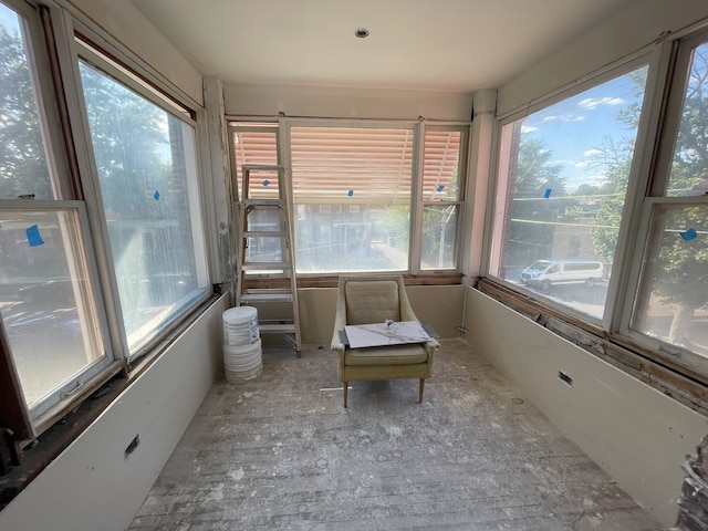 unfurnished sunroom featuring a healthy amount of sunlight