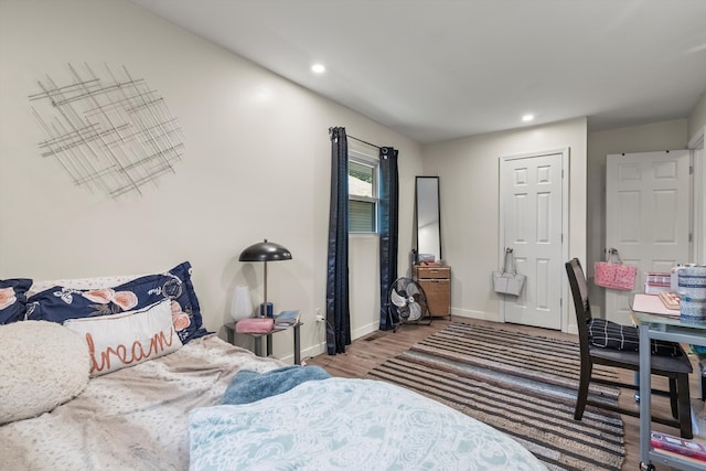 bedroom with wood-type flooring