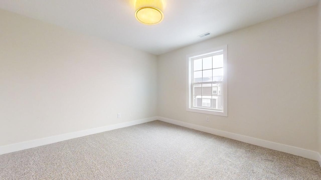 view of carpeted spare room