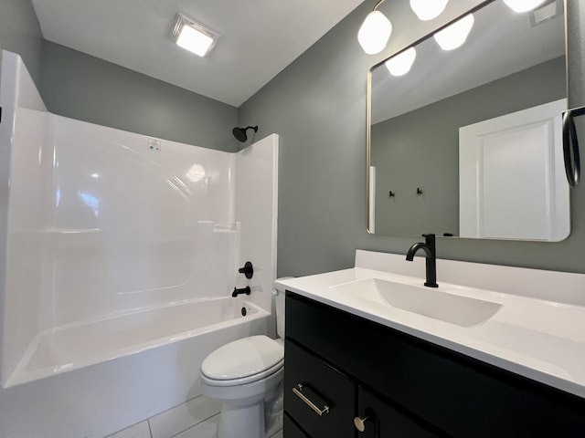 full bathroom featuring tile patterned flooring, vanity, bathing tub / shower combination, and toilet