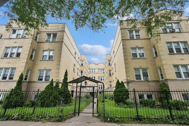 view of property with a fenced front yard