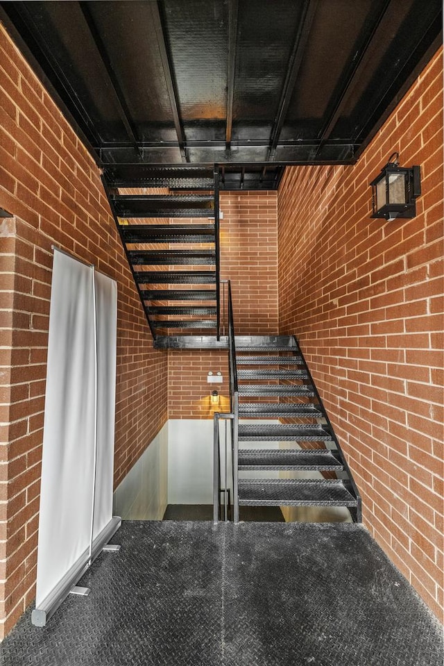 stairs with brick wall