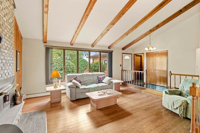 living room featuring vaulted ceiling with beams, light hardwood / wood-style flooring, a fireplace, a baseboard heating unit, and a notable chandelier