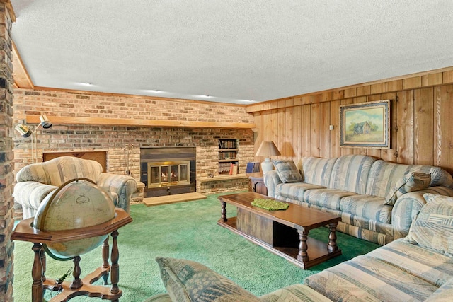 living room featuring carpet, a brick fireplace, brick wall, and a textured ceiling