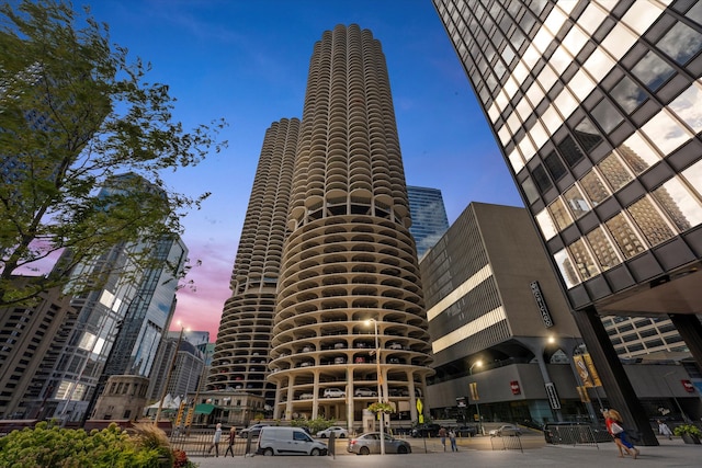 view of outdoor building at dusk